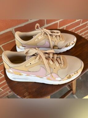 Nike Beige Sneakers with Pink Swoosh and Camo Trim